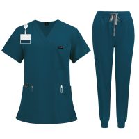 1688_image_share_0df5ffef42586c1cfedbd834944d3b34 Green V-Neck Scrub